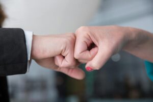 close up shot of a fist bump