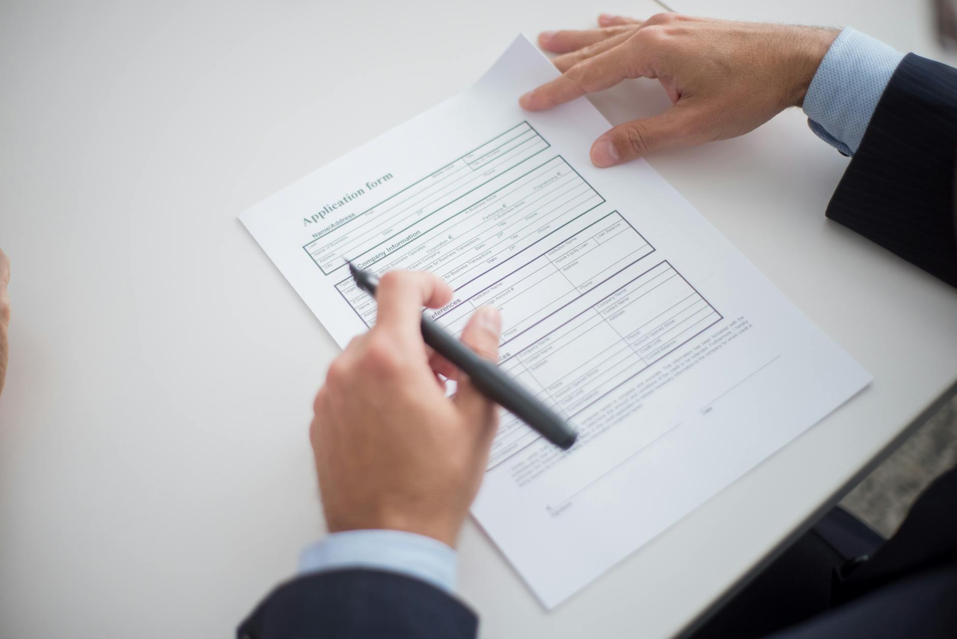 close up shot of a person holding a paper